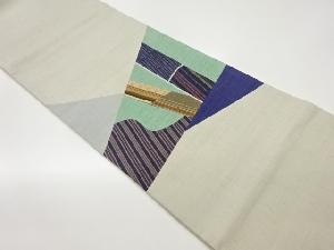 手織り紬切り嵌め変わり縞に菱・華文模様織出し袋帯